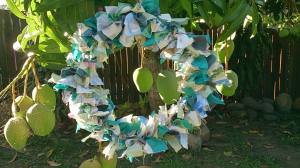 My ocean themed Christmas wreath using scraps of old material & a coat hanger.